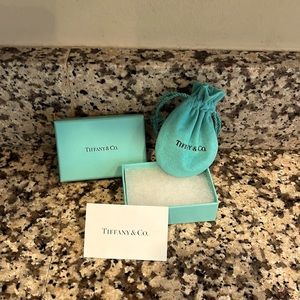 Tiffany & Co. Box & drawstring bag.